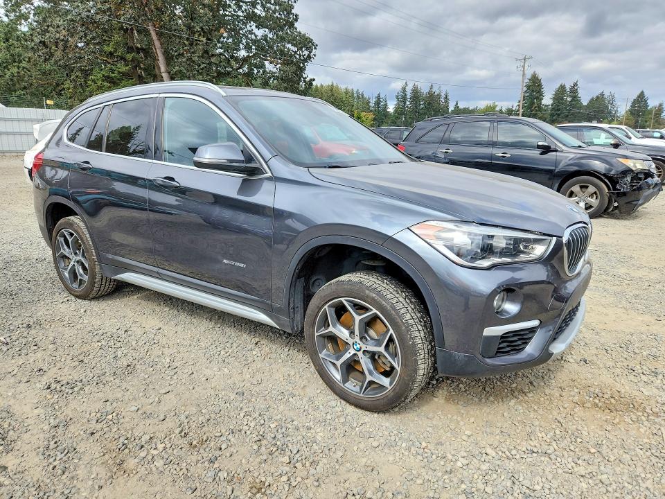 Photo 4 from auction – 2017 BMW X1 with VIN WBXHT3C34H5F83209