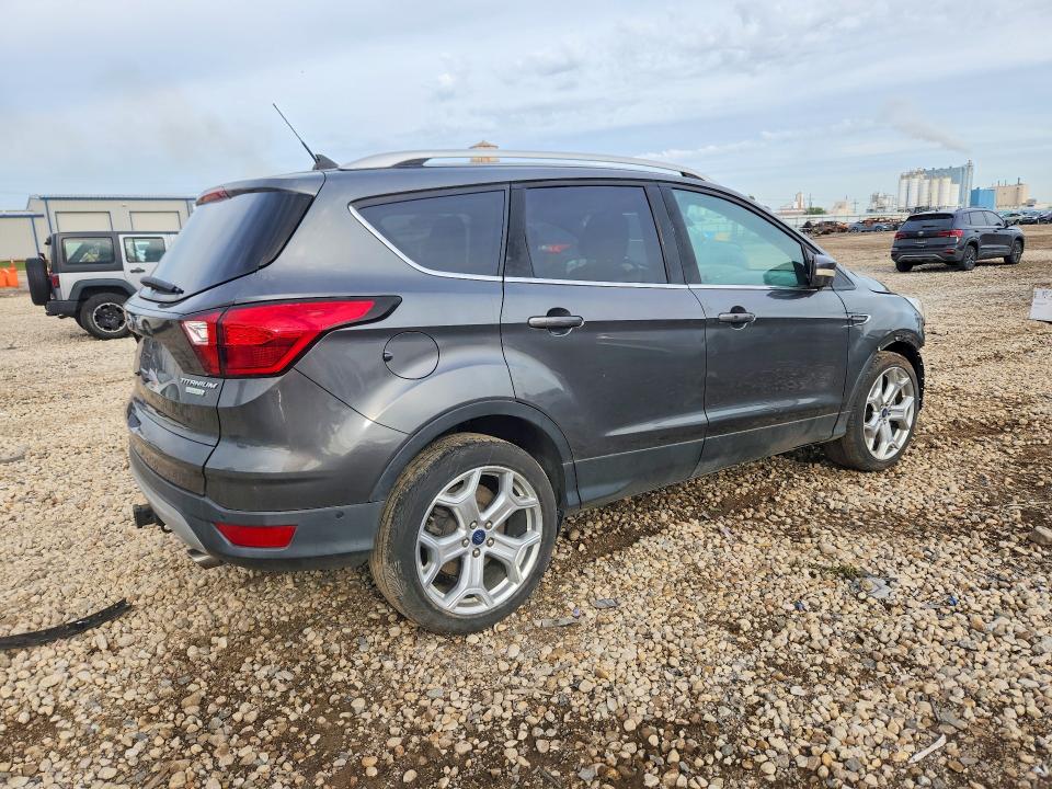 Photo 3 from auction – 2019 FORD ESCAPE with VIN 1FMCU0J93KUA84613