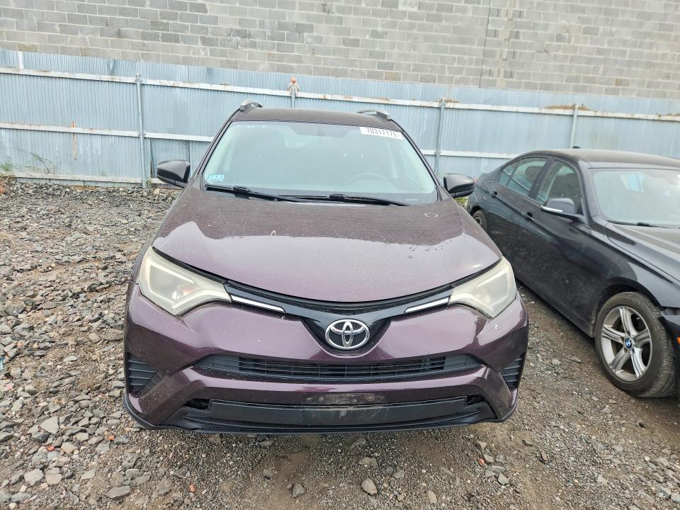 Photo 5 from auction – 2016 TOYOTA RAV4 with VIN 2T3BFREV0GW504599