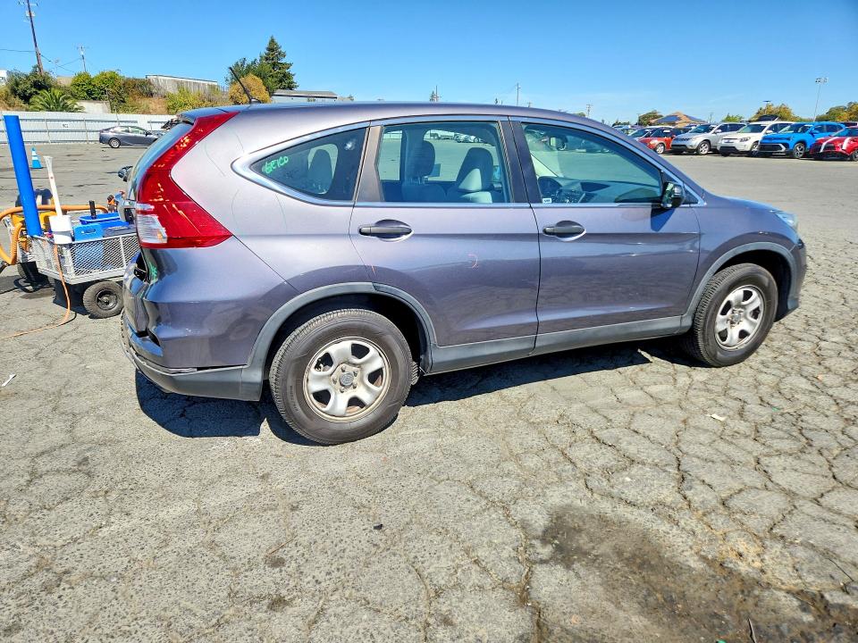 Photo 3 from auction – 2015 HONDA CR-V with VIN 3CZRM3H32FG717655
