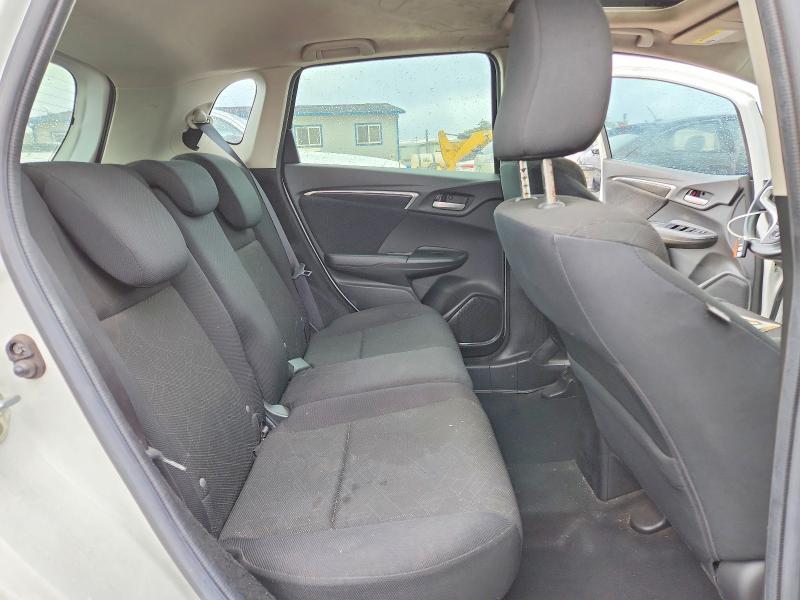 Снимка 10 от търг – 2016 HONDA FIT с VIN JHMGK5H70GX037346