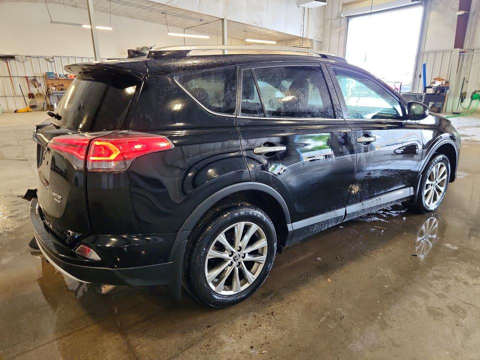 Photo 3 from auction – 2016 TOYOTA RAV4 with VIN 2T3DFREVXGW473225