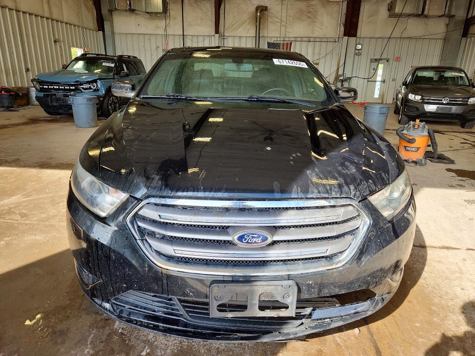 Photo 5 from auction – 2014 FORD TAURUS with VIN 1FAHP2H81EG112489