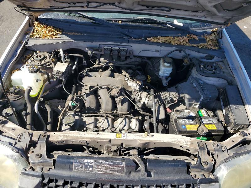Снимка 12 от търг – 2005 FORD ESCAPE с VIN 1FMCU03155KC23034