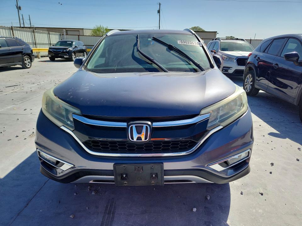 Photo 5 from auction – 2015 HONDA CR-V with VIN 2HKRM3H76FH525848