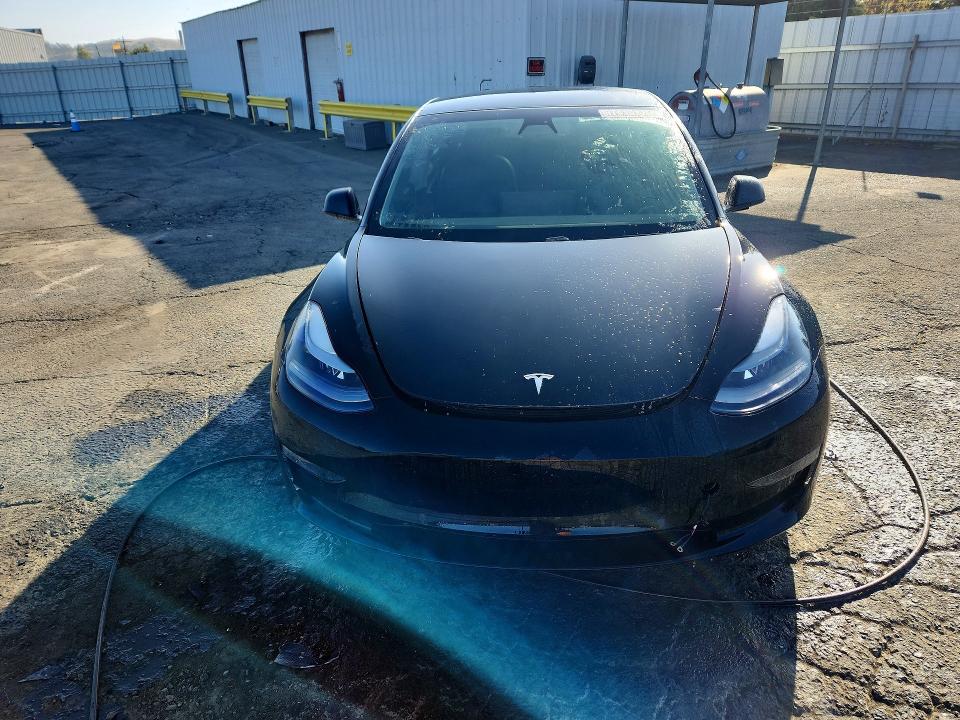 Снимка 5 от търг – 2021 TESLA MODEL 3 с VIN 5YJ3E1EAXMF929478