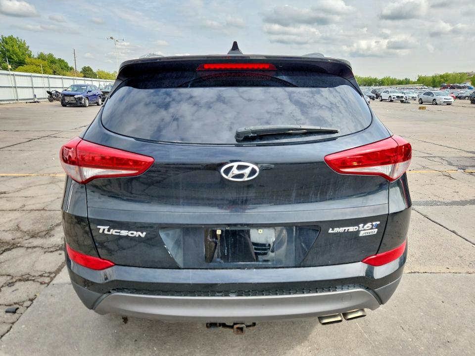 Снимка 6 от търг – 2016 HYUNDAI TUCSON с VIN KM8J3CA27GU161103