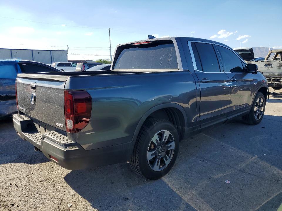 Photo 3 from auction – 2017 HONDA RIDGELINE with VIN 5FPYK3F65HB001465