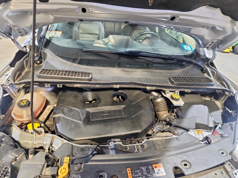 Photo 12 from auction – 2018 FORD ESCAPE with VIN 1FMCU9J93JUB18228