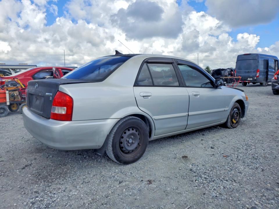 Photo 3 from auction – 2000 MAZDA PROTEGE with VIN JM1BJ2224Y0276922