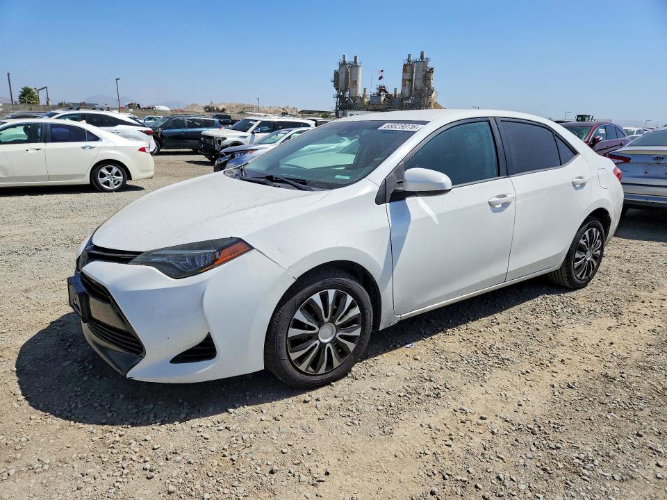 TOYOTA COROLLA 2018 with VIN 5YFBURHE6JP765822 - Photo from auction