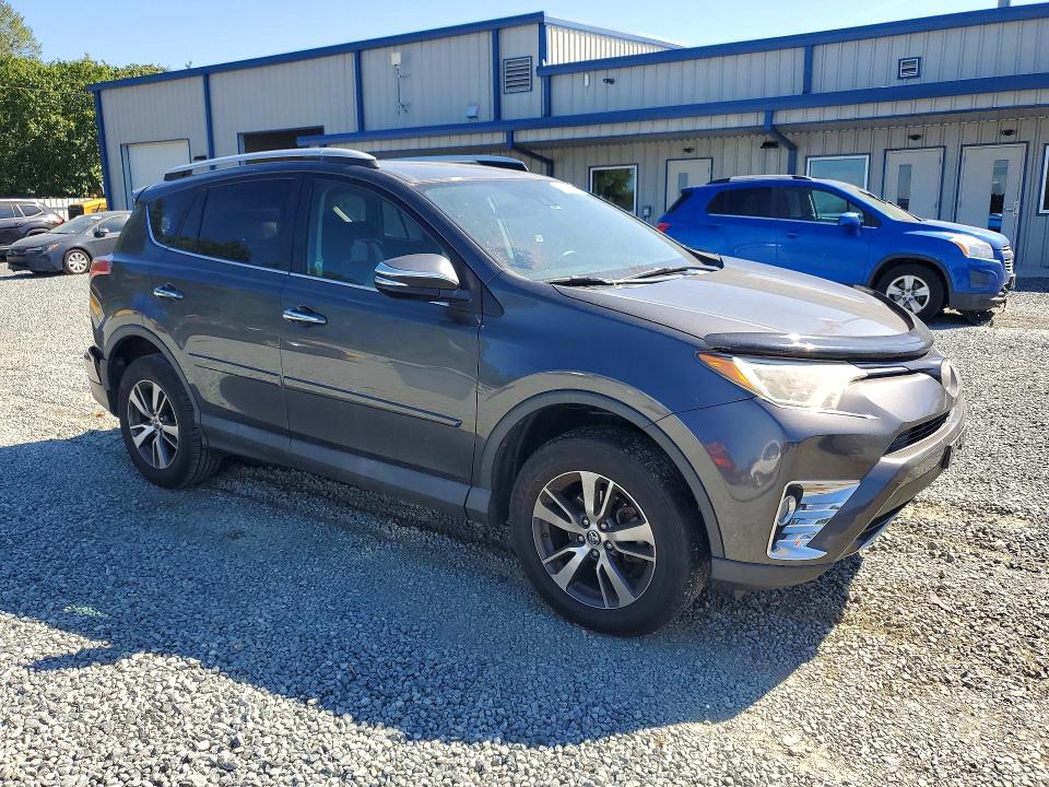 Photo 4 from auction – 2018 TOYOTA RAV4 with VIN 2T3WFREV3JW470800