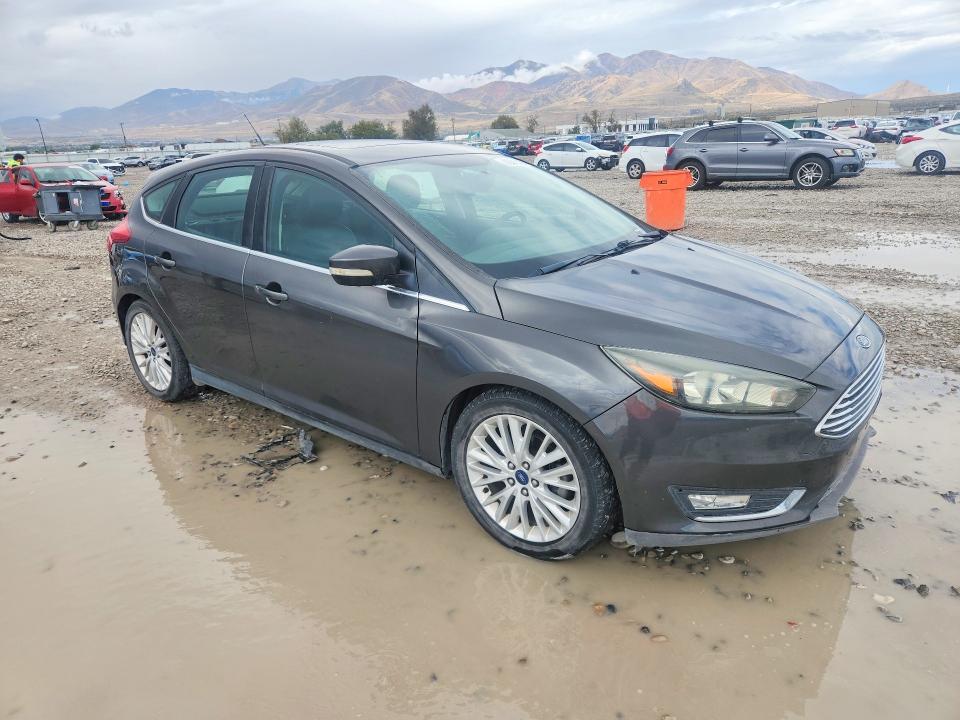 Photo 4 from auction – 2016 FORD FOCUS with VIN 1FADP3N21GL221520