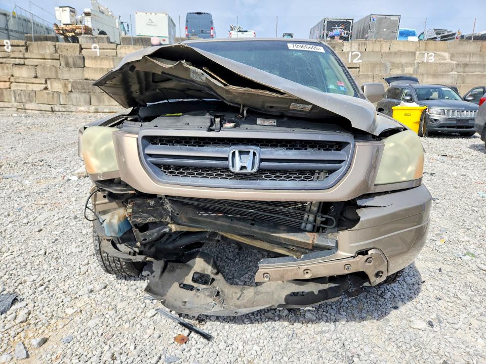 Photo 5 from auction – 2004 HONDA PILOT with VIN 2HKYF18664H508482