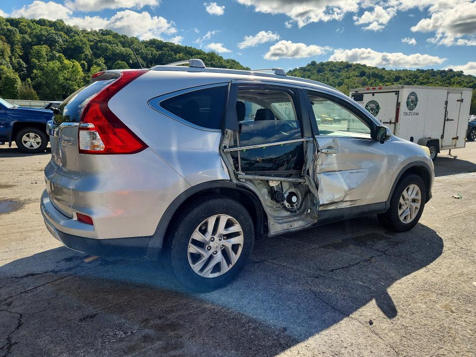 Photo 3 from auction – 2016 HONDA CR-V with VIN 2HKRM4H71GH713670