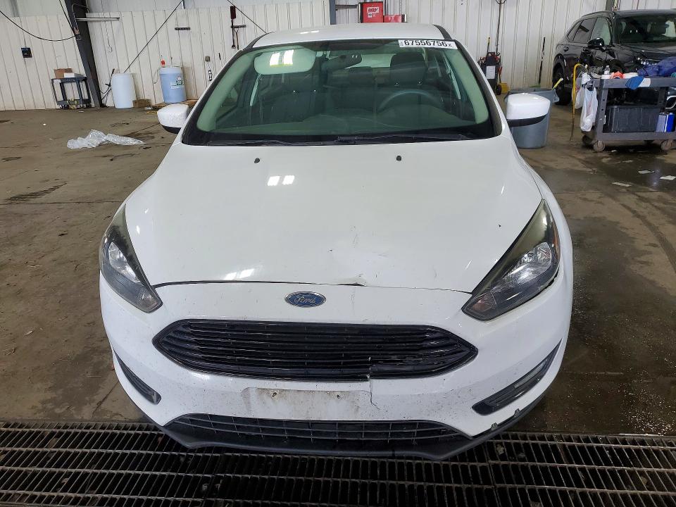Photo 5 from auction – 2018 FORD FOCUS with VIN 1FADP3FEXJL233312