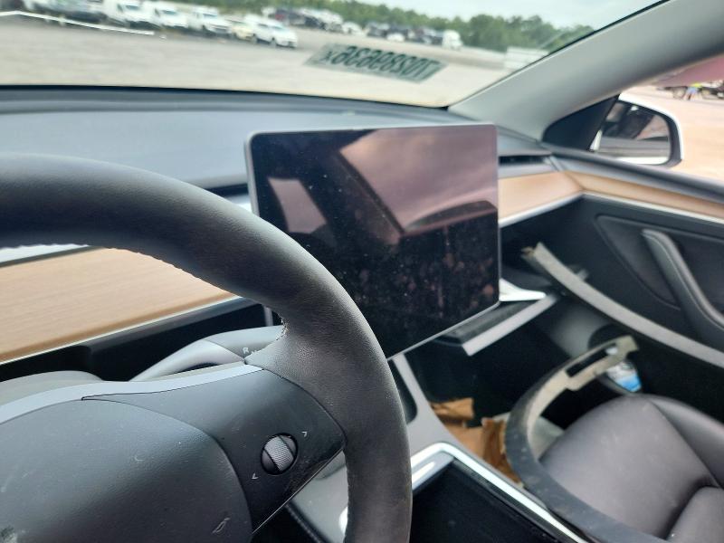 Снимка 9 от търг – 2024 TESLA MODEL Y с VIN 7SAYGDEE6RF169810