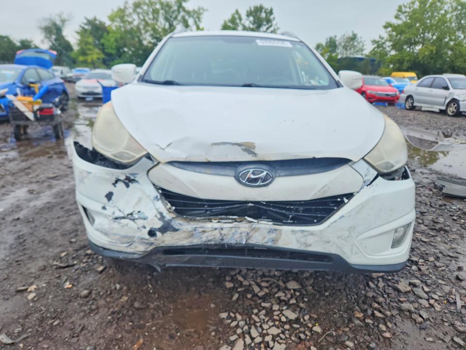 Photo 5 from auction – 2013 HYUNDAI TUCSON with VIN KM8JUCAC3DU753731