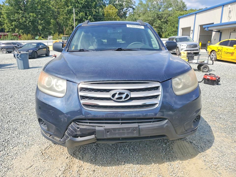 Photo 5 from auction – 2012 HYUNDAI SANTA FE with VIN 5XYZGDAB3CG097459