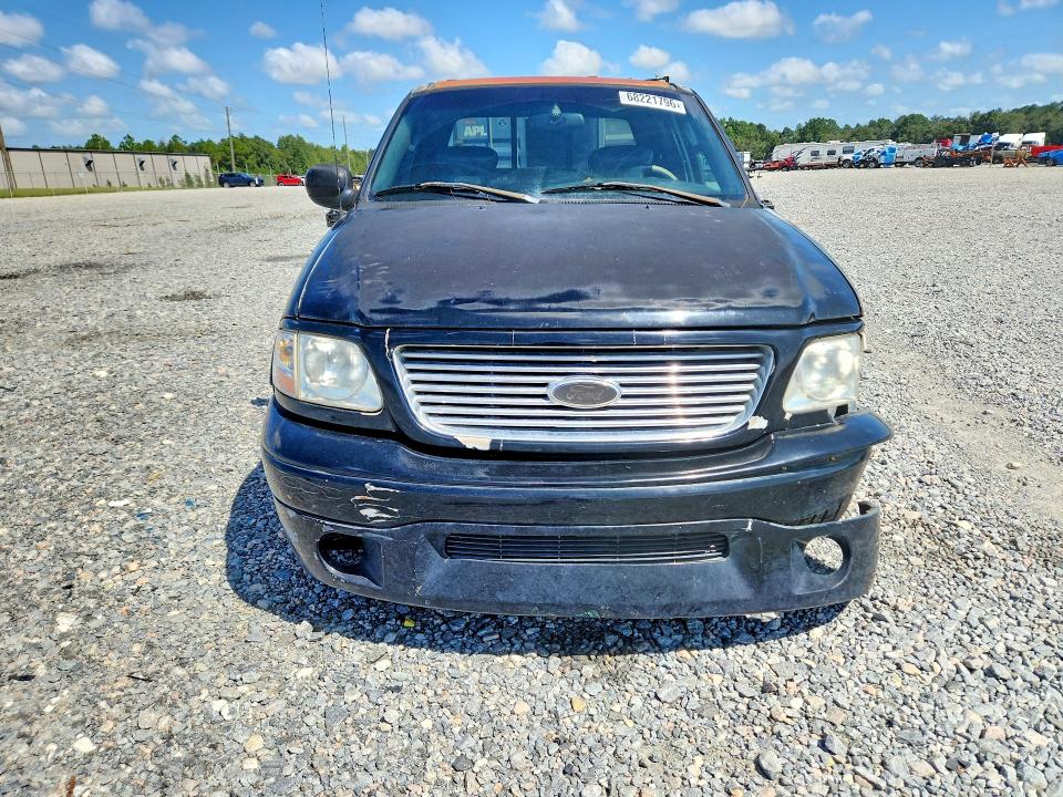 Photo 5 from auction – 2003 FORD F150 with VIN 1FTRW07323KB56619