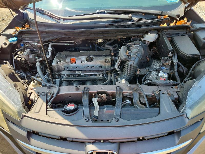 Photo 11 from auction – 2013 HONDA CR-V with VIN 5J6RM4H71DL050814