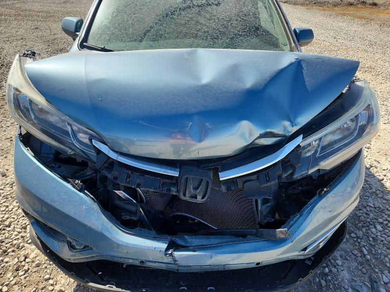 Photo 12 from auction – 2016 HONDA CR-V with VIN 2HKRM4H79GH634411
