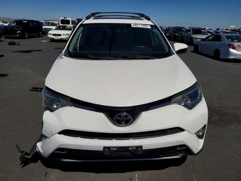 Снимка 5 от търг – 2018 TOYOTA RAV4 с VIN 2T3RFREV2JW726809