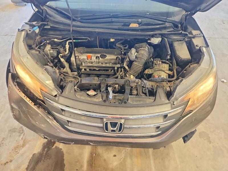 Photo 12 from auction – 2014 HONDA CR-V with VIN 5J6RM4H79EL018470
