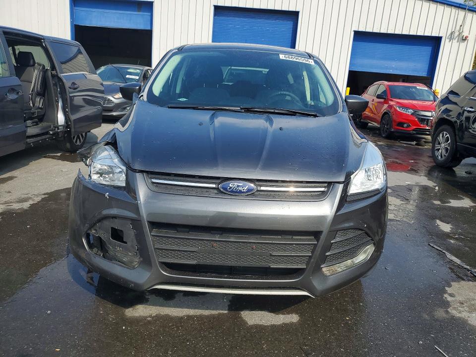 Photo 5 from auction – 2016 FORD ESCAPE with VIN 1FMCU0G79GUC18036