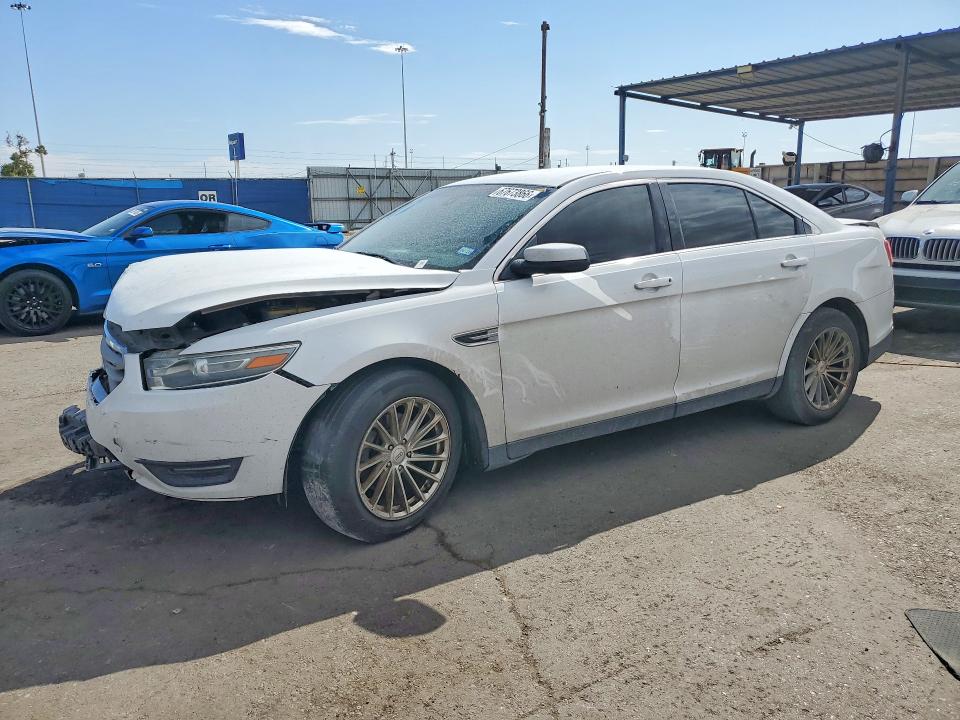 FORD TAURUS 2013 with VIN 1FAHP2E87DG198510 - Photo from auction
