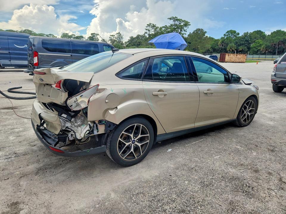 Photo 3 from auction – 2018 FORD FOCUS with VIN 1FADP3H2XJL266233