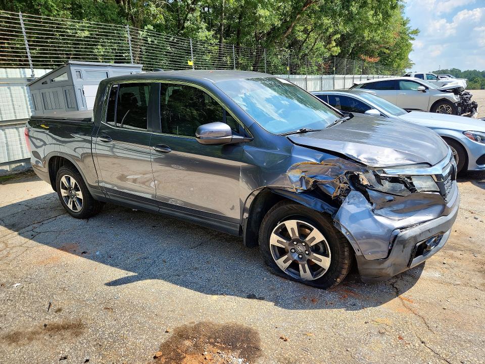 Photo 4 from auction – 2017 HONDA RIDGELINE with VIN 5FPYK3F53HB008728