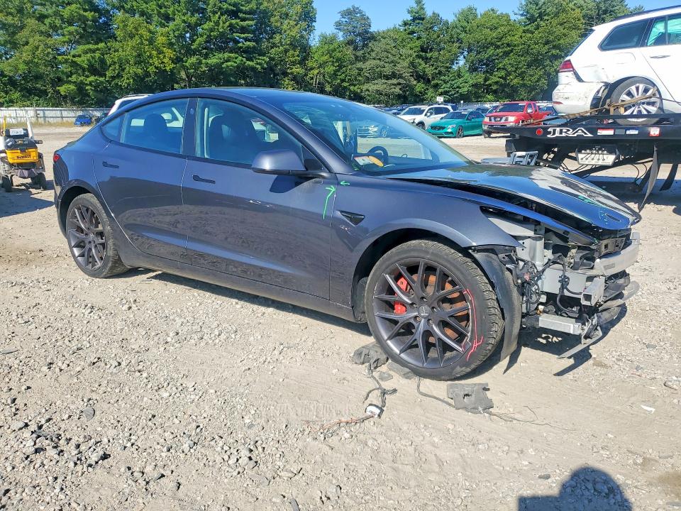 Снимка 4 от търг – 2022 TESLA MODEL 3 с VIN 5YJ3E1EC1NF265302