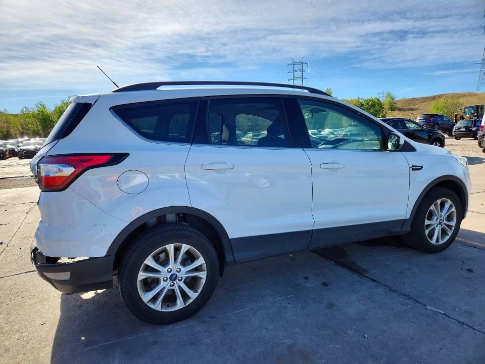 Photo 3 from auction – 2018 FORD ESCAPE with VIN 1FMCU9G9XJUC64908