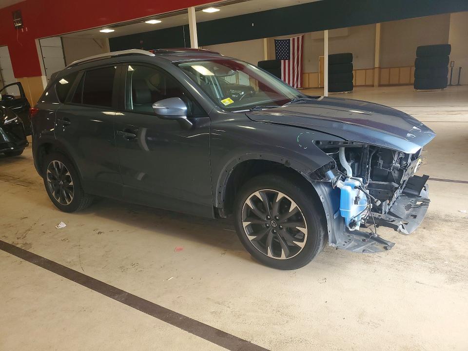 Photo 4 from auction – 2016 MAZDA CX-5 with VIN JM3KE4DY6G0605076
