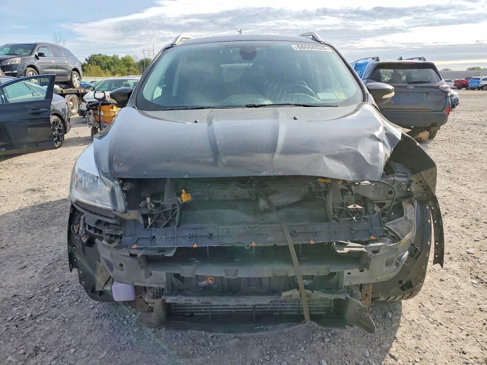 Снимка 5 от търг – 2015 FORD ESCAPE с VIN 1FMCU9J91FUA19897