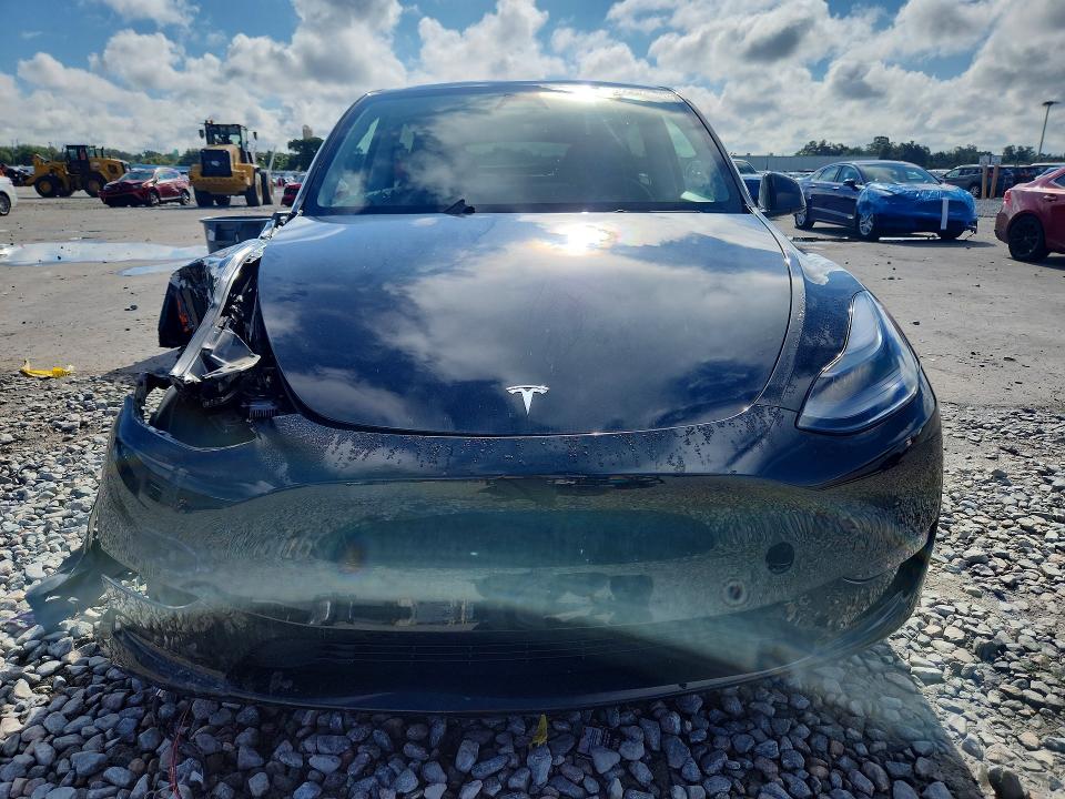 Снимка 5 от търг – 2023 TESLA MODEL Y с VIN 7SAYGDEFXPF941571
