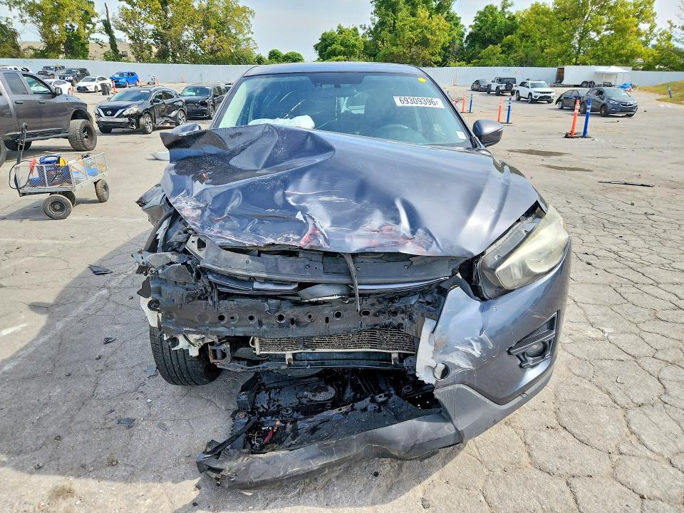 Снимка 5 от търг – 2016 MAZDA CX-5 с VIN JM3KE4CY8G0868378