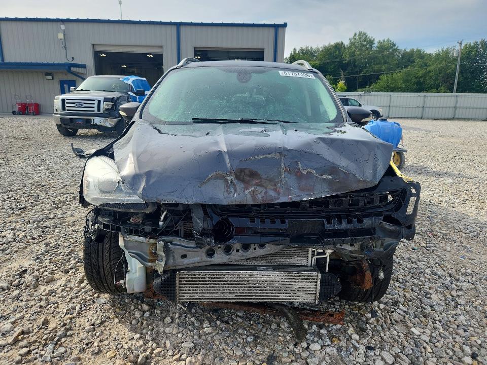 Photo 5 from auction – 2016 FORD ESCAPE with VIN 1FMCU9J97GUA96002