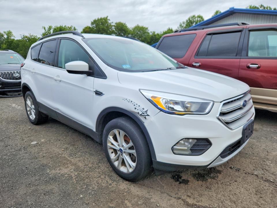 Photo 4 from auction – 2018 FORD ESCAPE with VIN 1FMCU9GD0JUD11514