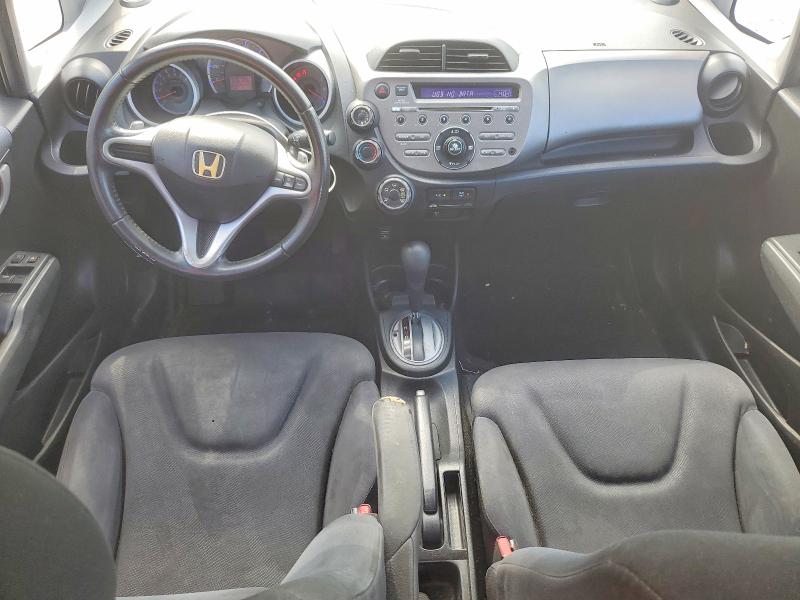 Photo 8 from auction – 2009 HONDA FIT with VIN JHMGE88459S057817
