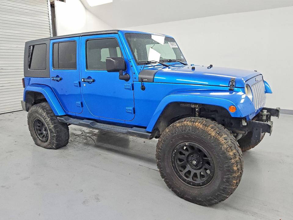 Снимка 4 от търг – 2016 JEEP WRANGLER UNLIMITED с VIN 1C4BJWEG0GL156062
