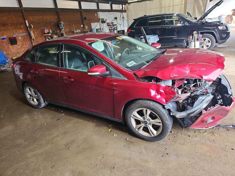 Photo 4 from auction – 2014 FORD FOCUS with VIN 1FADP3F25EL274524