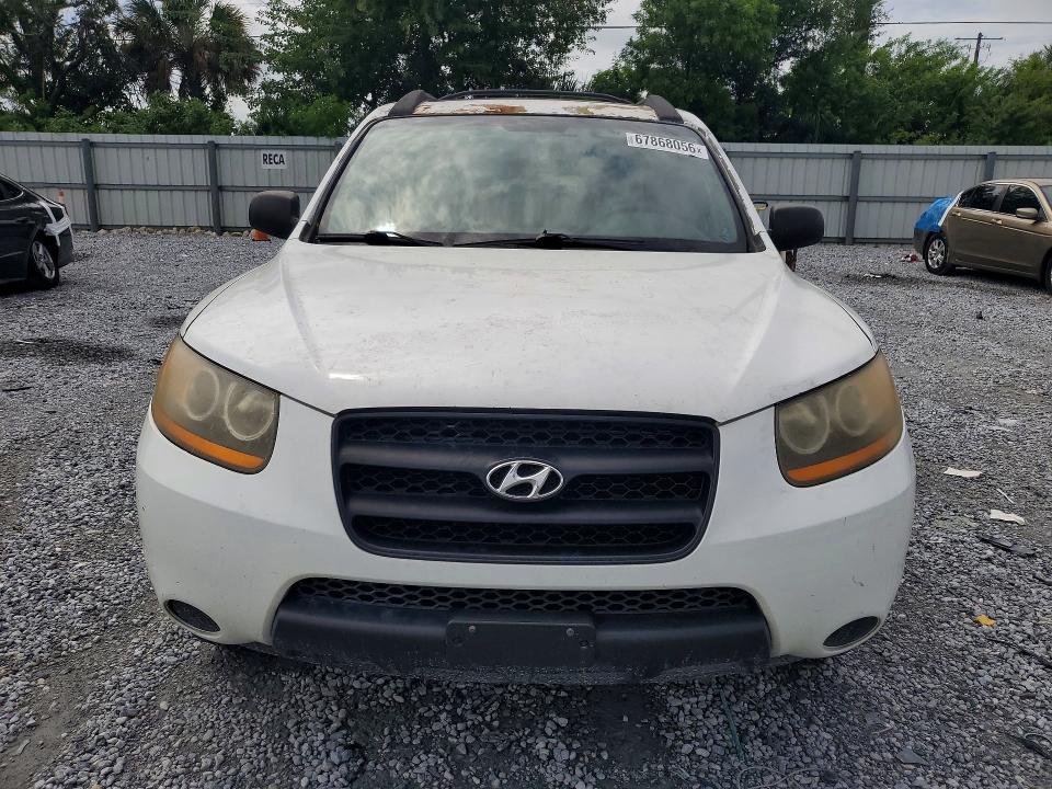 Photo 5 from auction – 2009 HYUNDAI SANTA FE with VIN 5NMSG13D79H320535