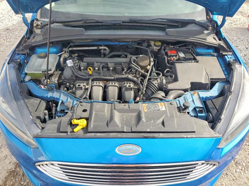 Photo 11 from auction – 2015 FORD FOCUS with VIN 1FADP3J26FL304509