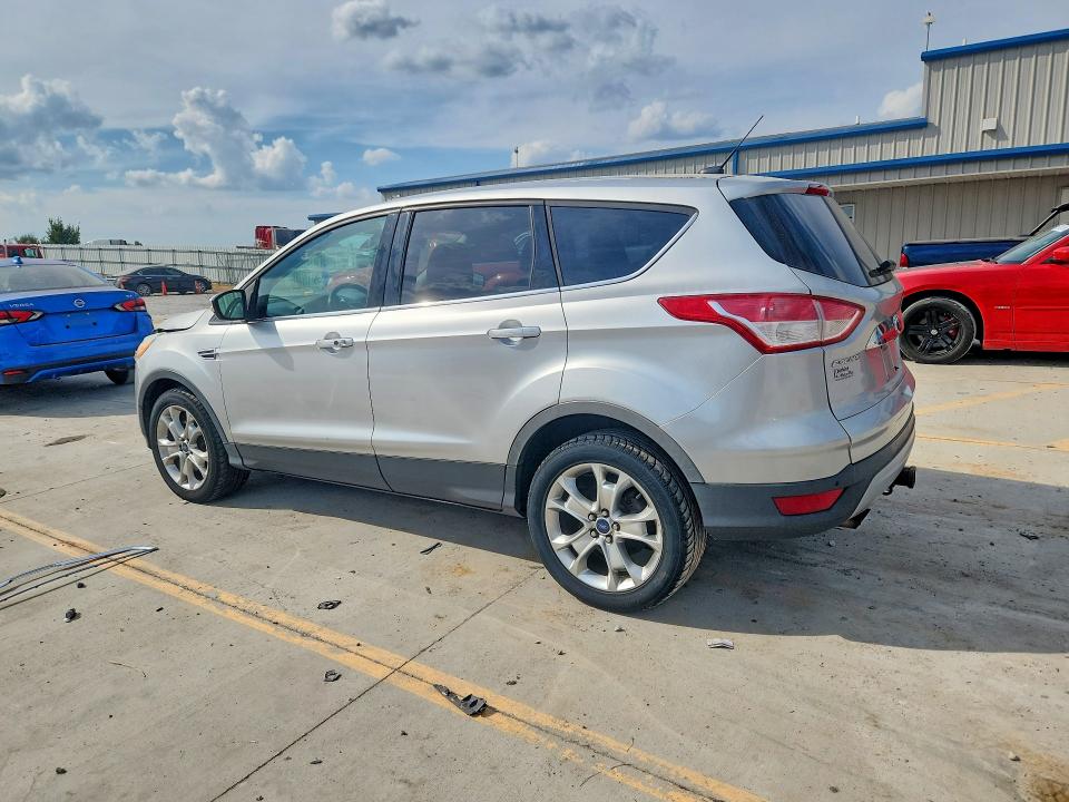 Снимка 2 от търг – 2014 FORD ESCAPE с VIN 1FMCU9J92EUC57093