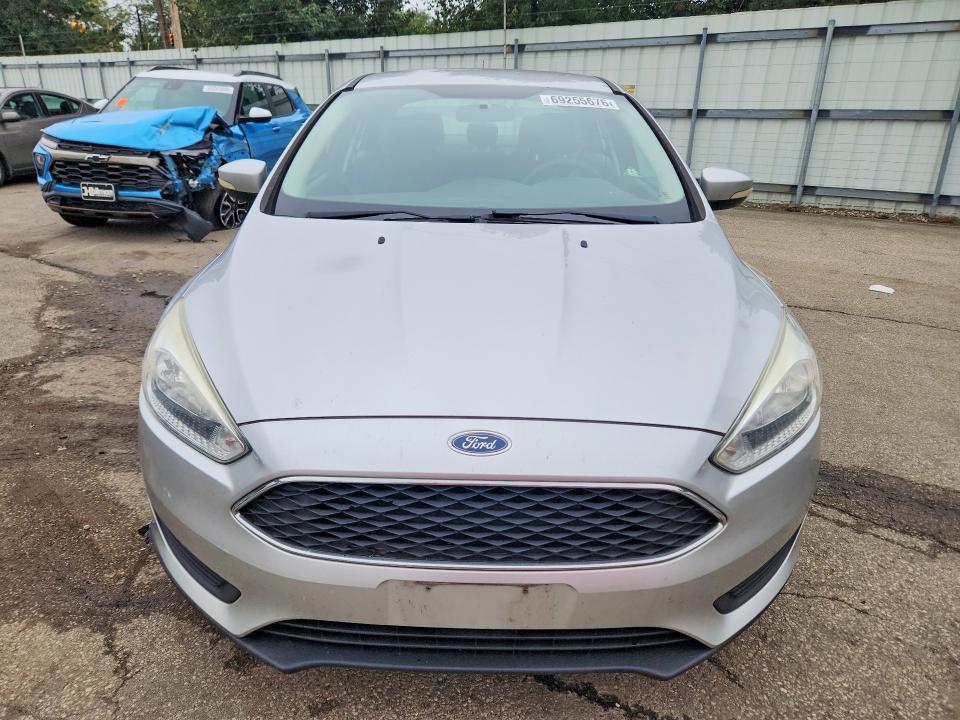 Снимка 5 от търг – 2016 FORD FOCUS с VIN 1FADP3F29GL251069