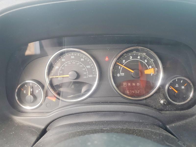 Photo 9 from auction – 2014 JEEP COMPASS with VIN 1C4NJDEBXED734553