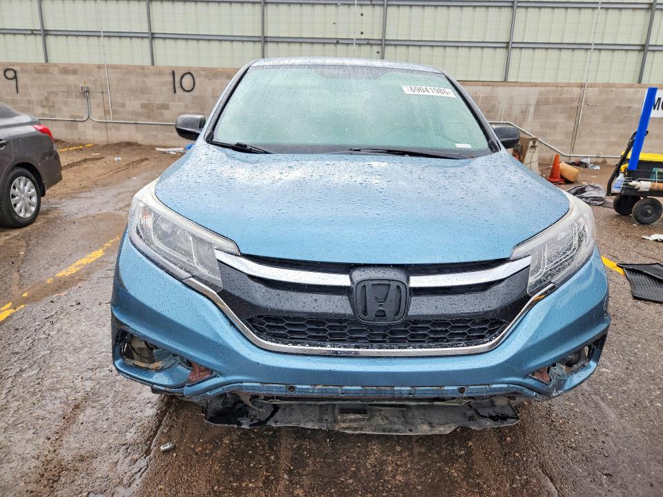 Photo 5 from auction – 2015 HONDA CR-V with VIN 2HKRM3H36FH556286