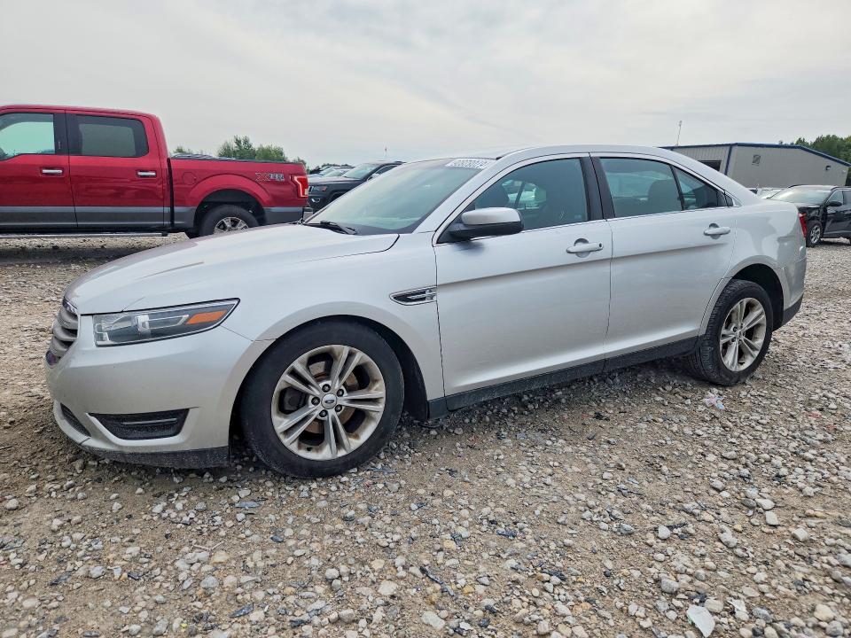 FORD TAURUS 2014 with VIN 1FAHP2E84EG177843 - Photo from auction